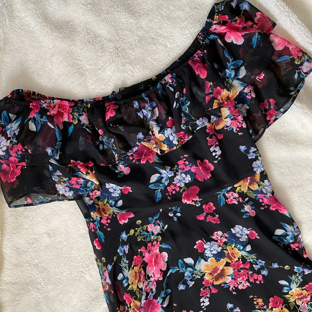 Off the shoulder floral dress falls about mid calf